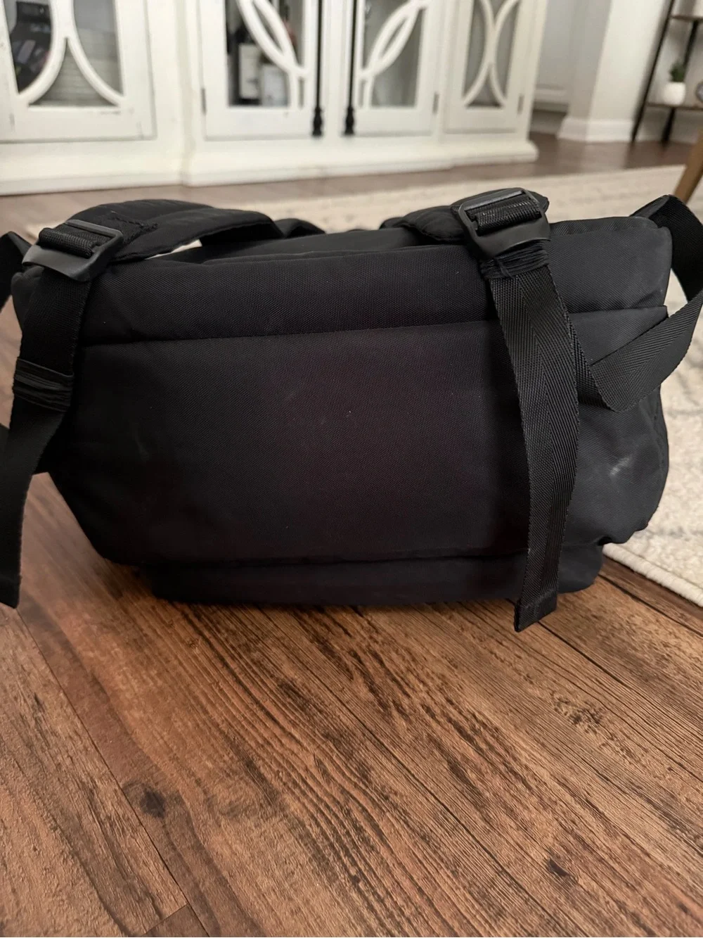 Amazon Black Quilted Backpack with Gold Accents